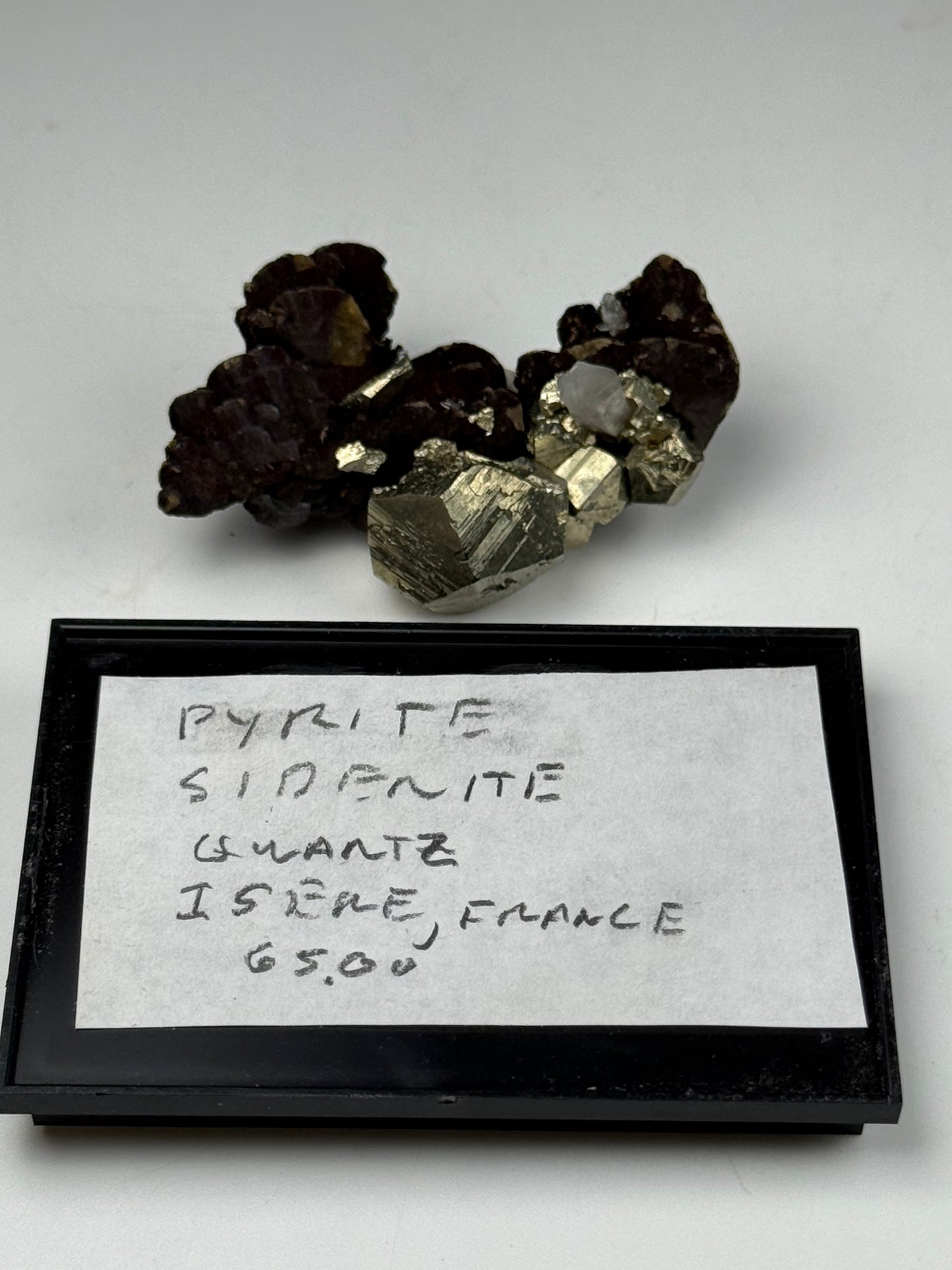 Pyrite on Siderite and Quartz