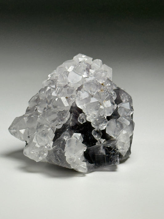 Quartz on Fluorite