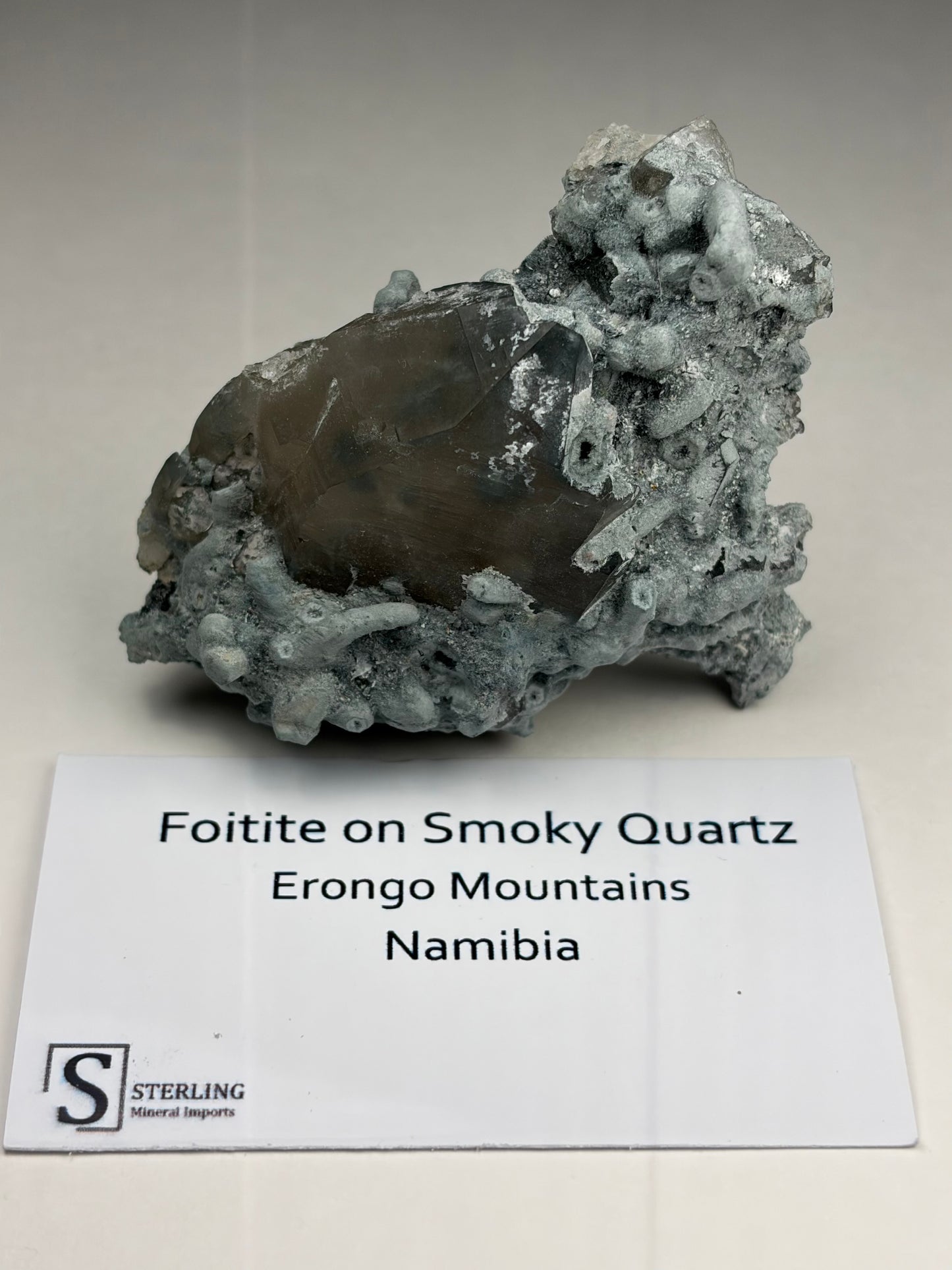 Foitite on Smoky Quartz